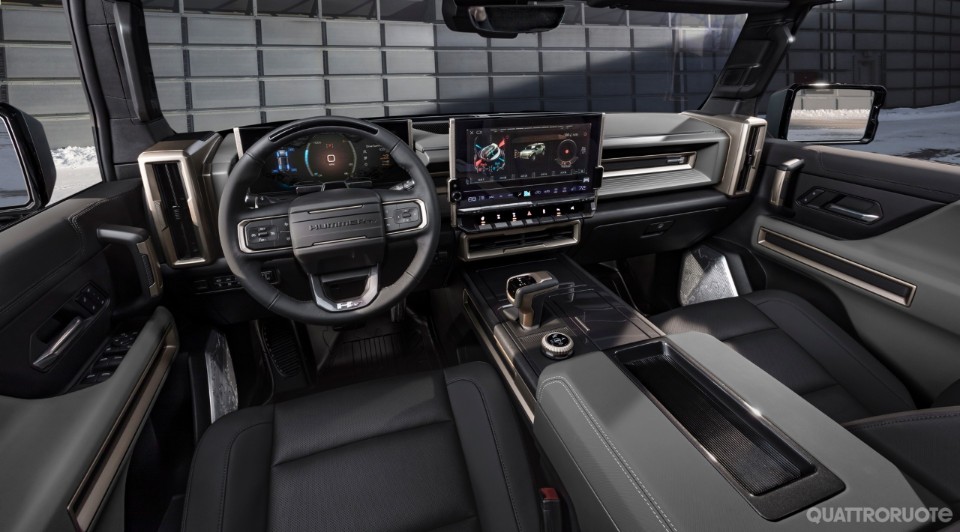 The GMC HUMMER EV SUV debuts in the low-contrast Lunar Shadow interior and includes a spacious cargo area and an architecturally inspired cabin. The GMC HUMMER EV SUV debuts in the low-contrast Lunar Shadow interior and includes a spacious cargo area and an architecturally inspired cabin.